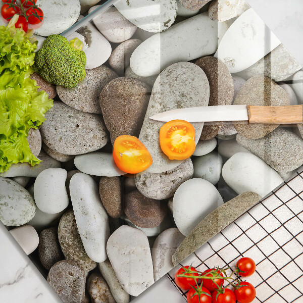 Deska do krojenia Tło małe kamienie