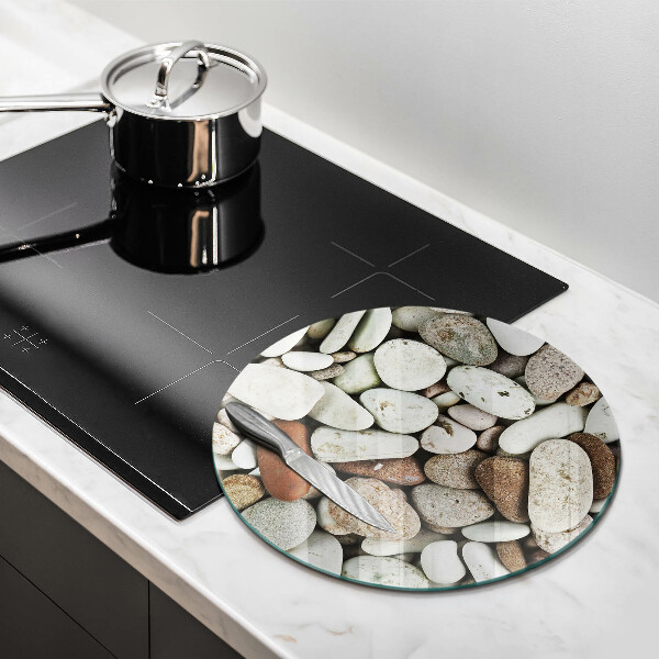 Deska kuchenna szklana Tło małe kamienie