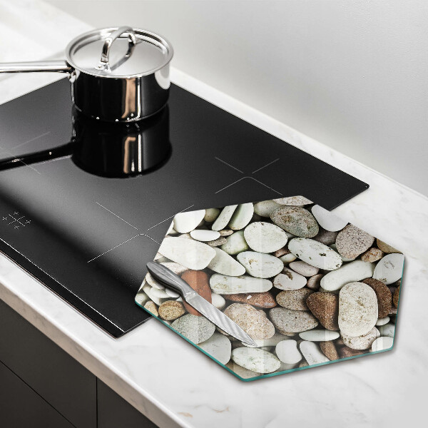 Deska szklana do kuchni Tło małe kamienie