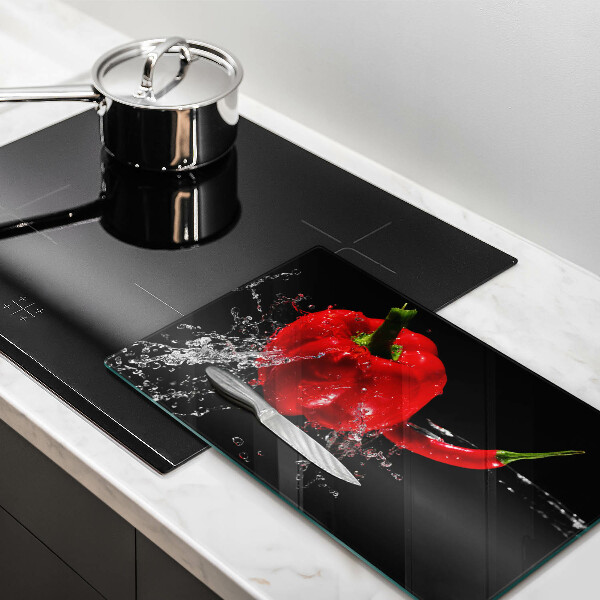 Osłona ściany przy kuchence gazowej Czerwone papryki w wodzie