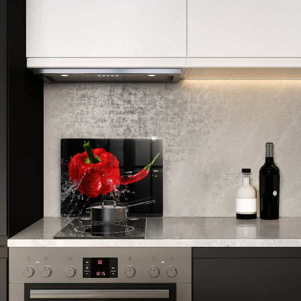 Osłona ściany przy kuchence gazowej Czerwone papryki w wodzie