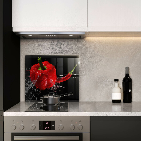 Osłona ściany przy kuchence gazowej Czerwone papryki w wodzie