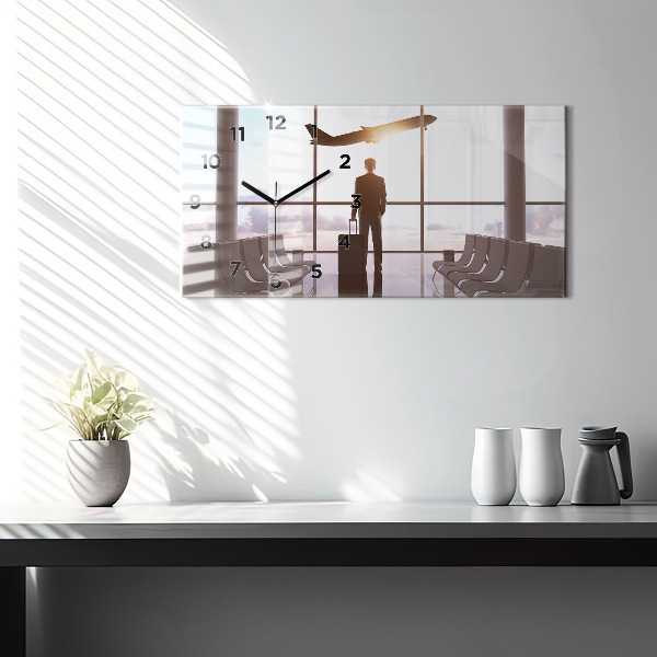 Zegar ścienny poziomy Człowiek na lotnisku
