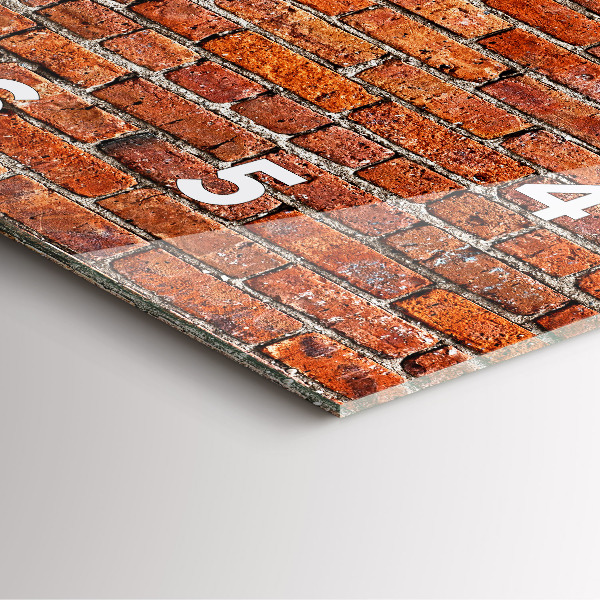 Kwadratowy zegar Stara ściana cegły