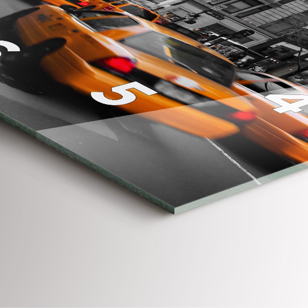 Kwadratowy zegar Manhattan i taksówki