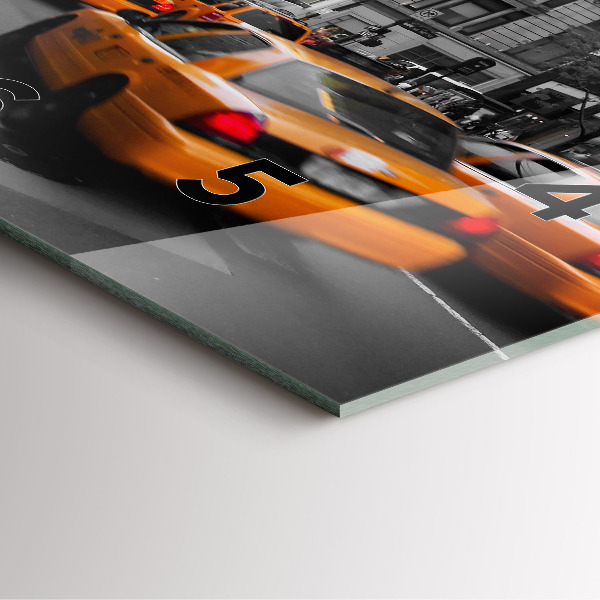 Kwadratowy zegar Manhattan i taksówki