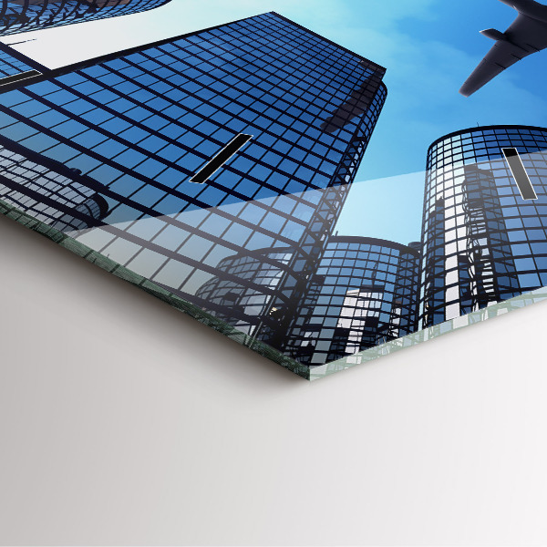 Kwadratowy zegar Samolot nad budynkami