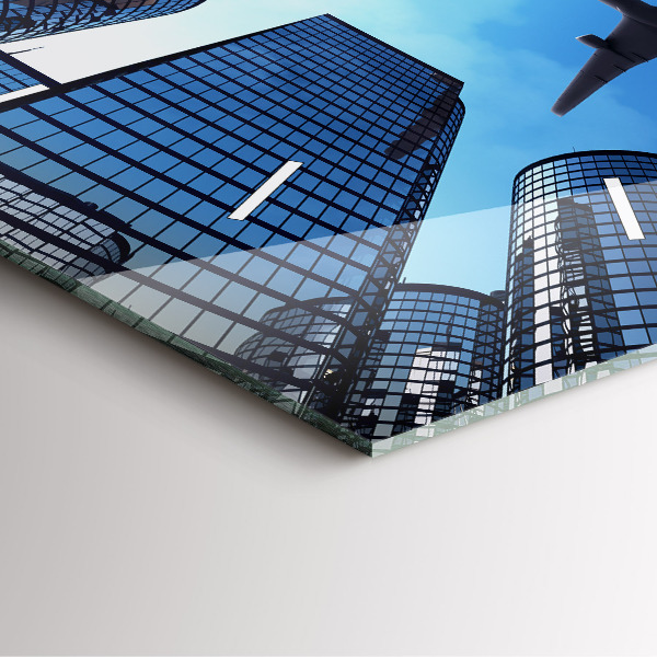 Kwadratowy zegar Samolot nad budynkami