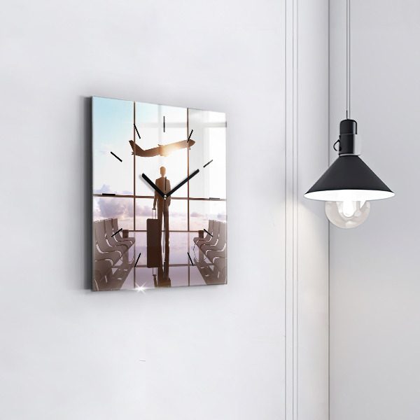 Kwadratowy zegar Człowiek na lotnisku