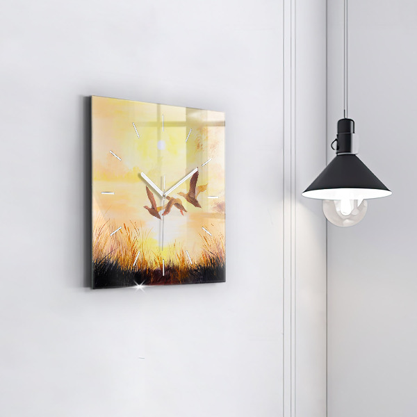 Kwadratowy zegar Żurawie o zachodzie słońca