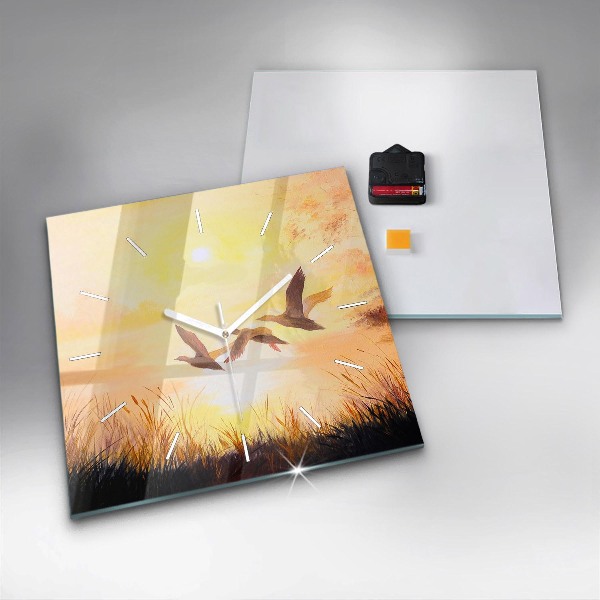 Kwadratowy zegar Żurawie o zachodzie słońca