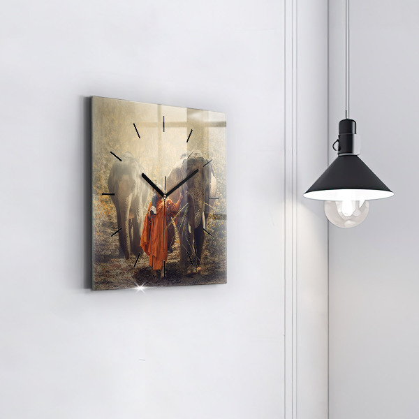 Zegar ścienny kwadratowy Mnich prowadzący słonie