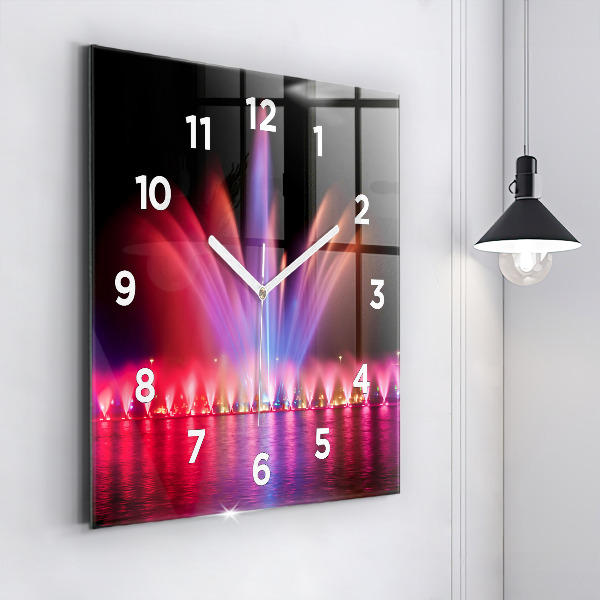 Kwadratowy zegar Wrocławska fontanna nocą