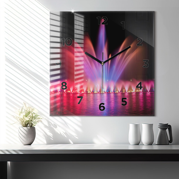 Kwadratowy zegar Wrocławska fontanna nocą