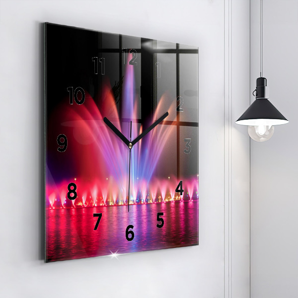 Kwadratowy zegar Wrocławska fontanna nocą