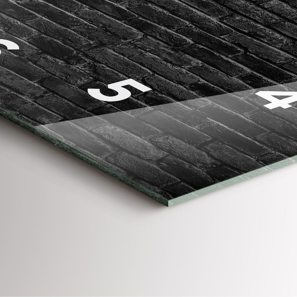 Kwadratowy zegar Ciemna ściana cegły