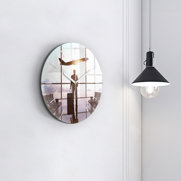 Zegar ścienny okrągły Człowiek na lotnisku