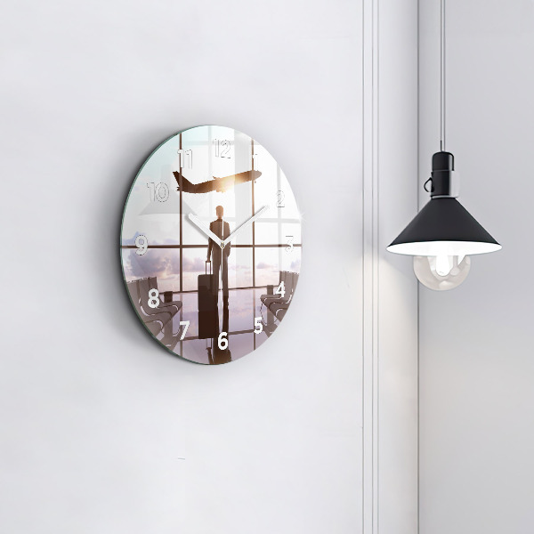 Zegar ścienny okrągły Człowiek na lotnisku